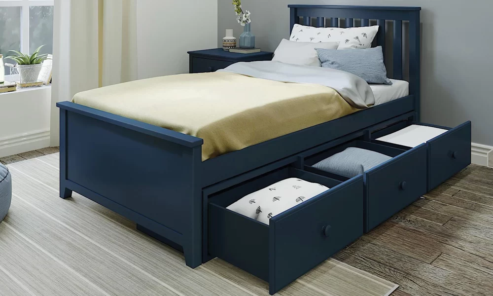 bed with open drawer's in the bedroom
