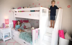 Two Kids In Bedroom On Twin Over Full Bunk Beds