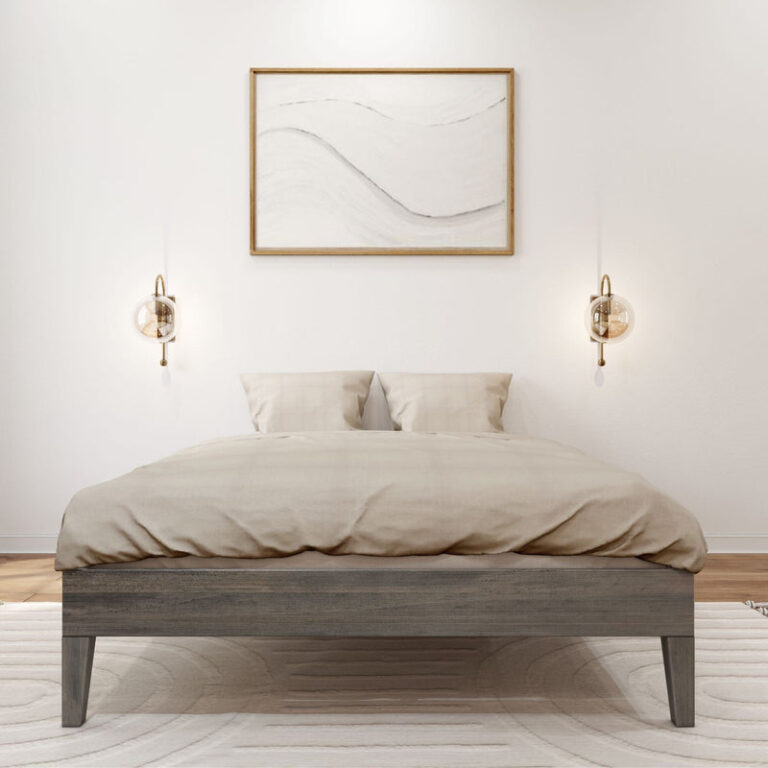 Full Size Platform Bed Driftwood Front View Full Size Platform Bed in Driftwood - front view in a bedroom with tan bedding, two wall sconces, and framed art above