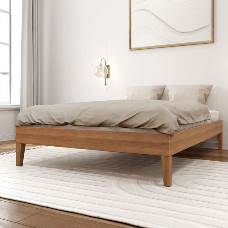 Full Size Platform Bed Pecan Room Scene 1 Full Size Platform Bed in Pecan - styled bedroom scene with beige duvet, glass wall sconce and framed abstract art viewed at an angle