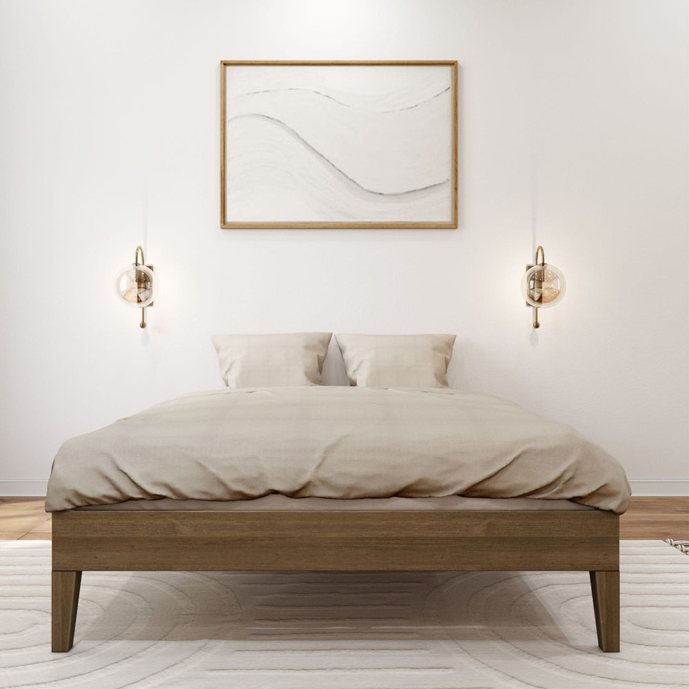 Full Size Platform Bed Walnut Front View Full Size Platform Bed in Walnut - front view of the bed with beige bedding, wall sconces and framed art above.