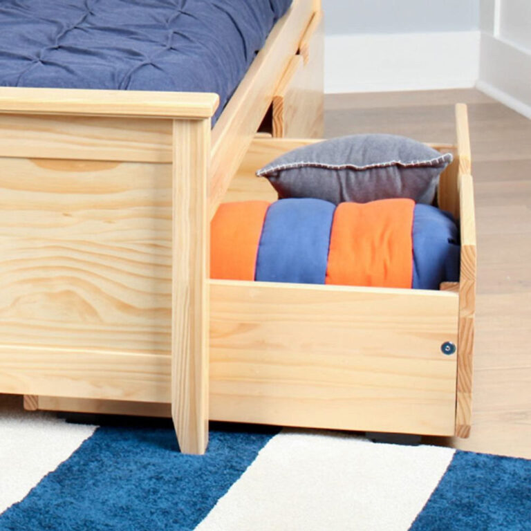 Max And Lily 2 Under Bed Storage Drawers Natural Room Scene Max and Lily 2 Under bed Storage Drawers in Natural - drawer rolled out from under a bed in a kids room, filled with pillows and a striped comforter
