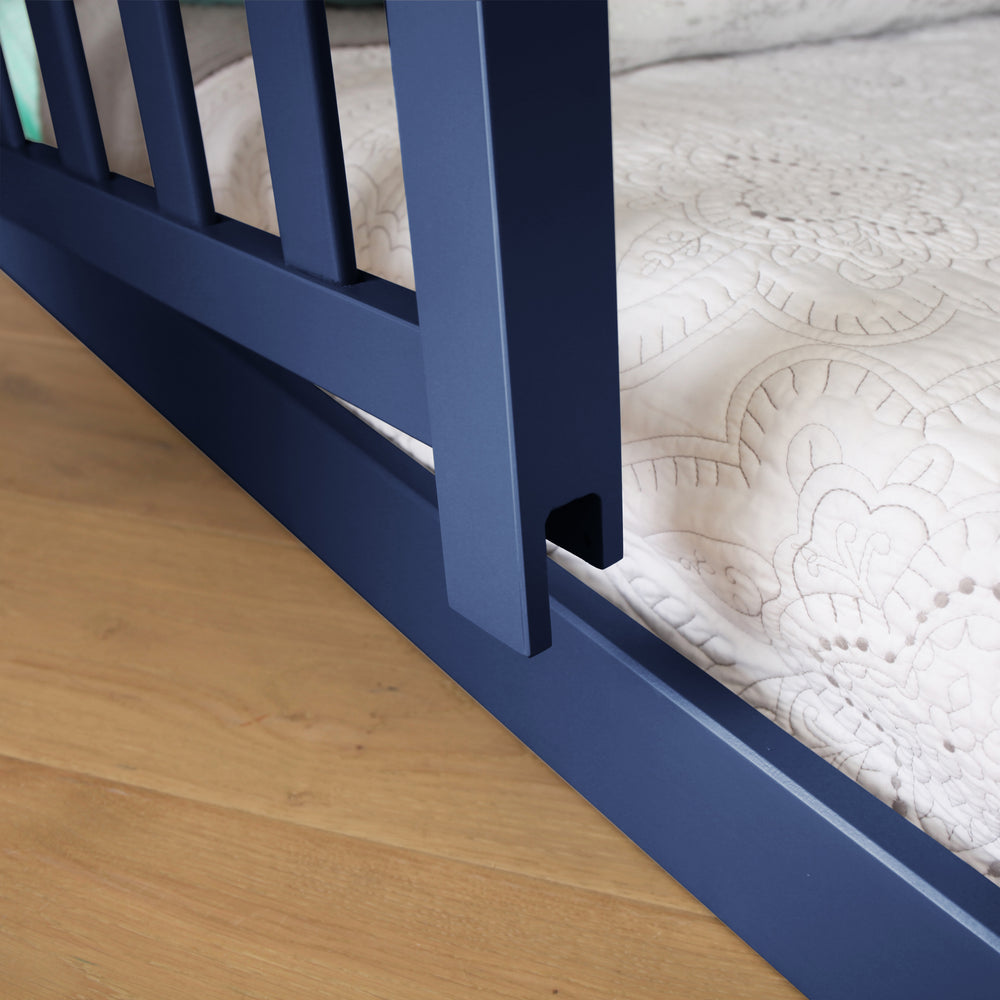 Max and Lily Add on Safety Guard Rail in blue - close-up of the vertical slats and lower rail beside a mattress