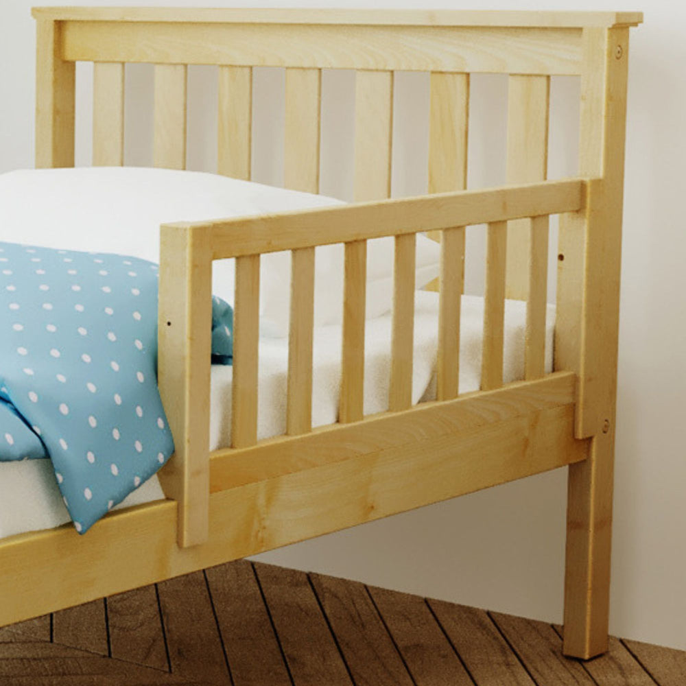 Max and Lily Add on Safety Guard Rail in Natural - installed on the side of a bed with mattress and blue polka-dot bedding