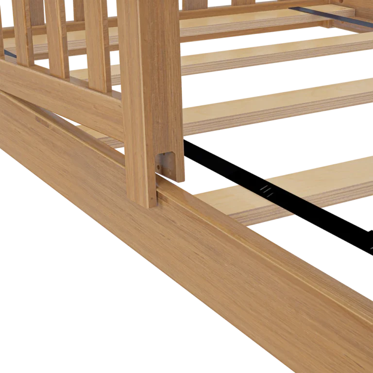 Max and Lily Add on Safety Guard Rail in pecan - close-up of the guard rail attached to the bed frame slats