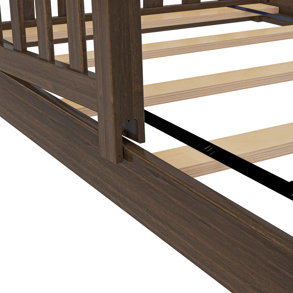 Max and Lily Add on Safety Guard Rail in walnut - close-up of the guard rail mounted to the bed frame above the slatted support platform.