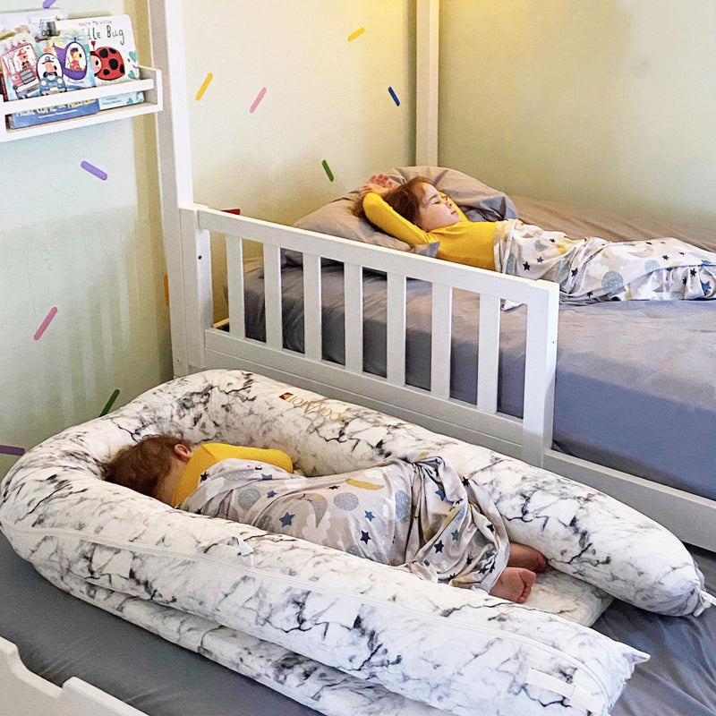 Max and Lily Add on Safety Guard Rail in White - two children sleeping, one on a bed fitted with the safety guard rail in a decorated kids' room.