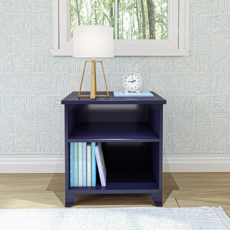 Max And Lily Classic Night Stand With Shelves Blue Front View Max and Lily Classic Night Stand With Shelves in Blue - front view against a window showing two open shelves holding books, a lamp, and a clock.