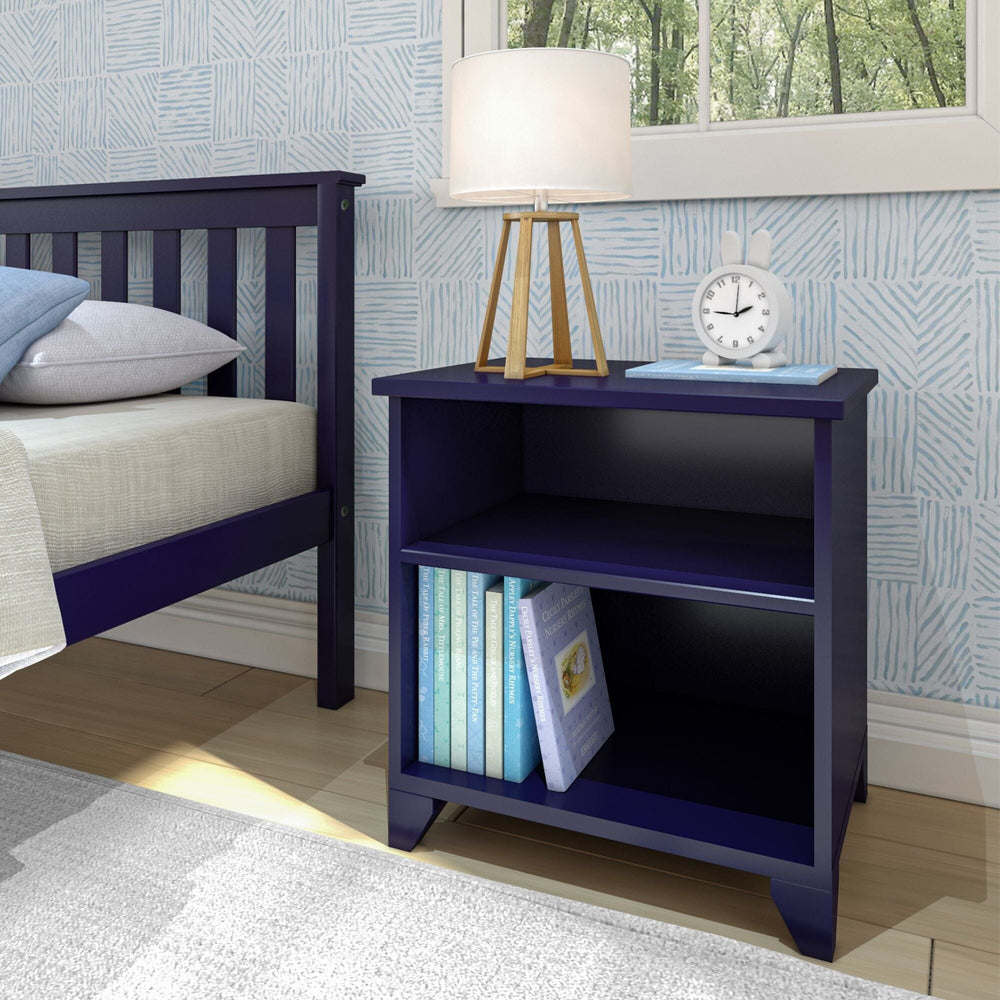 Max and Lily Classic Night Stand With Shelves in Blue - styled beside a bed with a lamp, clock, and children's books on its open shelves.