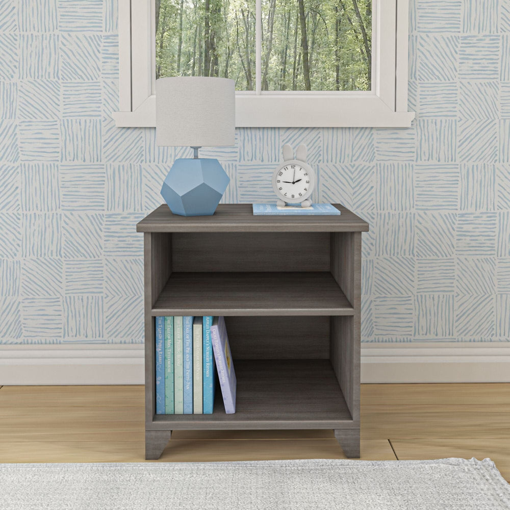 Max and Lily Classic Night Stand With Shelves in Clay - front view topped with a lamp and clock, books stored on the open lower shelf