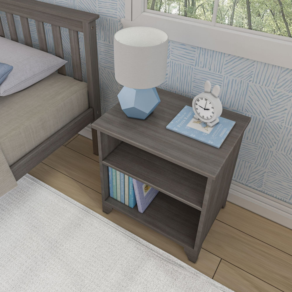 Max and Lily Classic Night Stand With Shelves in Clay - overhead room scene beside a bed with a lamp, alarm clock, and books on the shelf