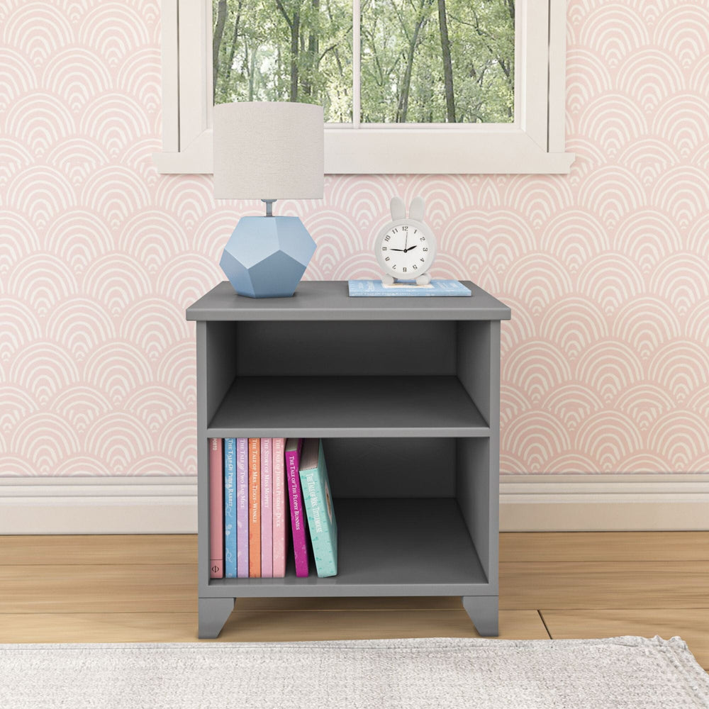 Max and Lily Classic Night Stand With Shelves in grey - front view showing two open shelves topped with a lamp, clock, and books.