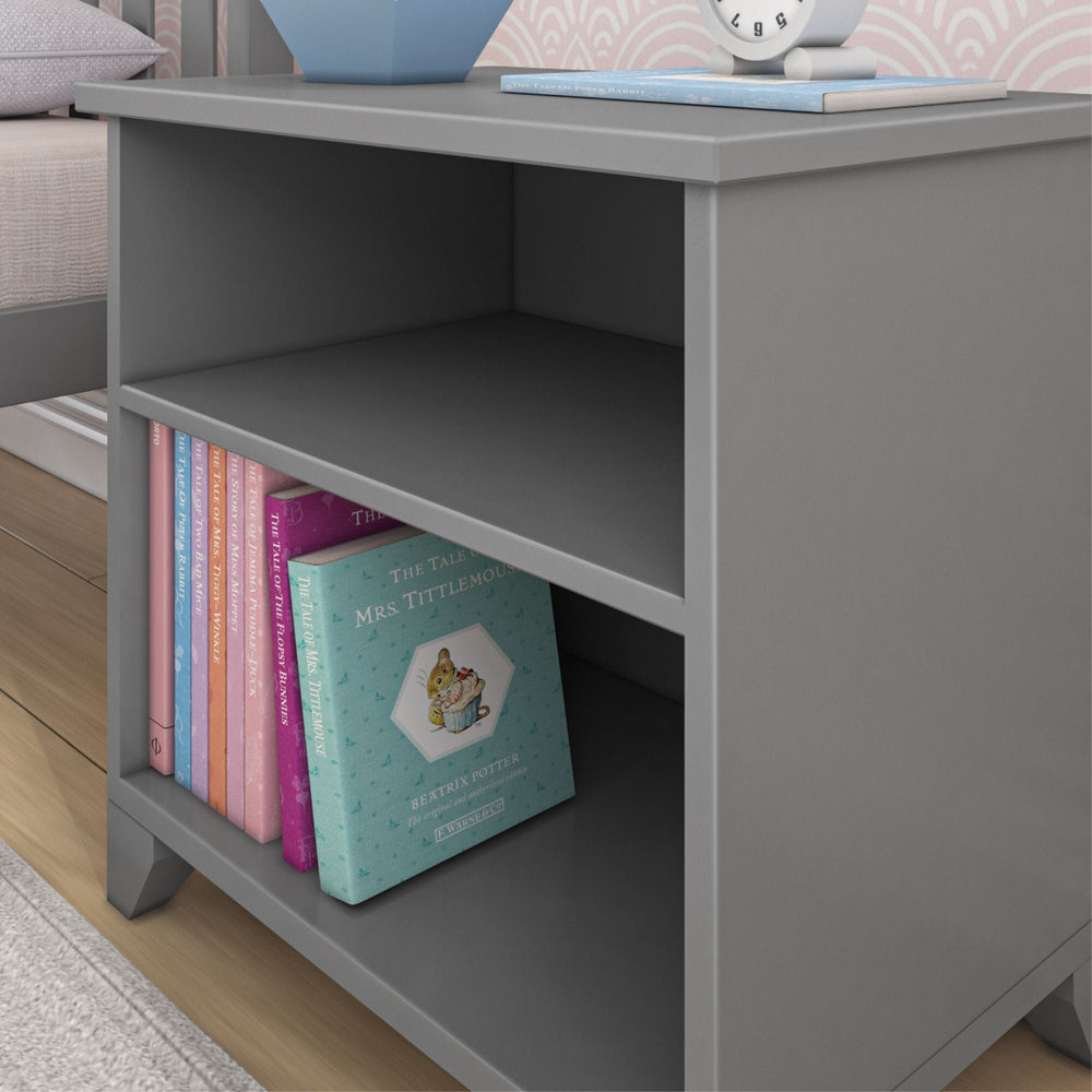 Max and Lily Classic Night Stand With Shelves in grey - close-up of the lower open shelf holding a row of children's books.