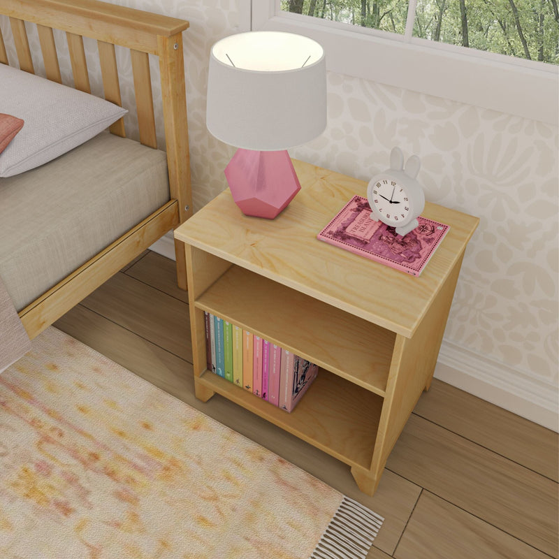 Max and Lily Classic Night Stand With Shelves in Natural - beside a bed with a lamp, clock, and books on the lower shelf in a child's room