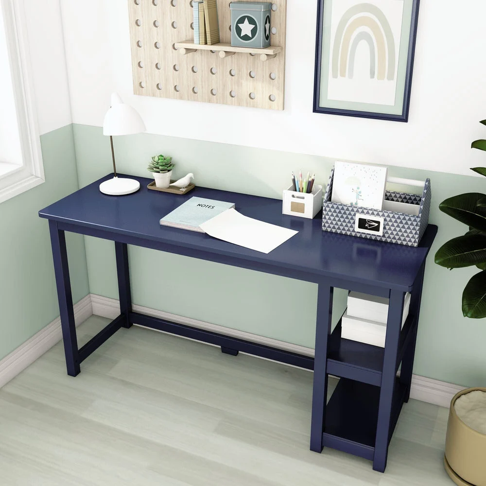 Max and Lily Desk With Shelves in Blue - angled view styled with a lamp, potted plant and desk organizers in a kids room