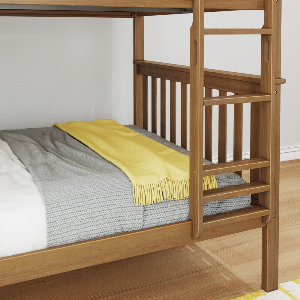 Max And Lily Full Over Full Bunk Bed Pecan Ladder Detail Max and Lily Full Over Full Bunk Bed in Pecan - closeup of the fixed ladder and lower bunk guardrail with the bed made up in grey and yellow bedding.