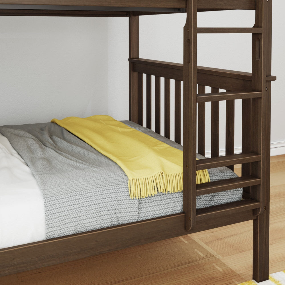 Max And Lily Full Over Full Bunk Bed Walnut Lower Bunk Detail 6 Max and Lily Full Over Full Bunk Bed in Walnut - closeup of the lower full-size bunk with grey bedding and yellow throw beside the attached wooden ladder