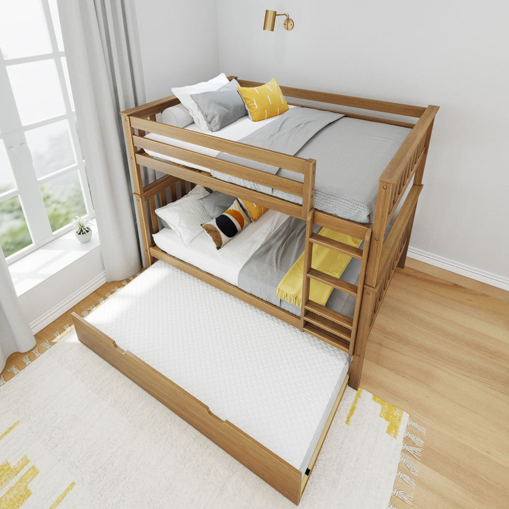 Max and Lily Full Over Full Bunk Bed with Trundle in Pecan - closeup of the lower bunk slatted headboard with pillows and the trundle drawer below
