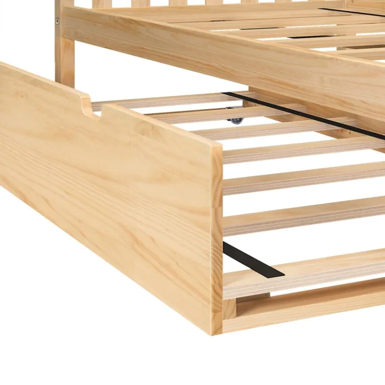 Max And Lily Full Platform Bed With Trundle Natural Trundle Detail Max and Lily Full Platform Bed With Trundle in Natural - close-up of the trundle unit rolled out beneath the bed frame, showing its slat base and cut-out handle