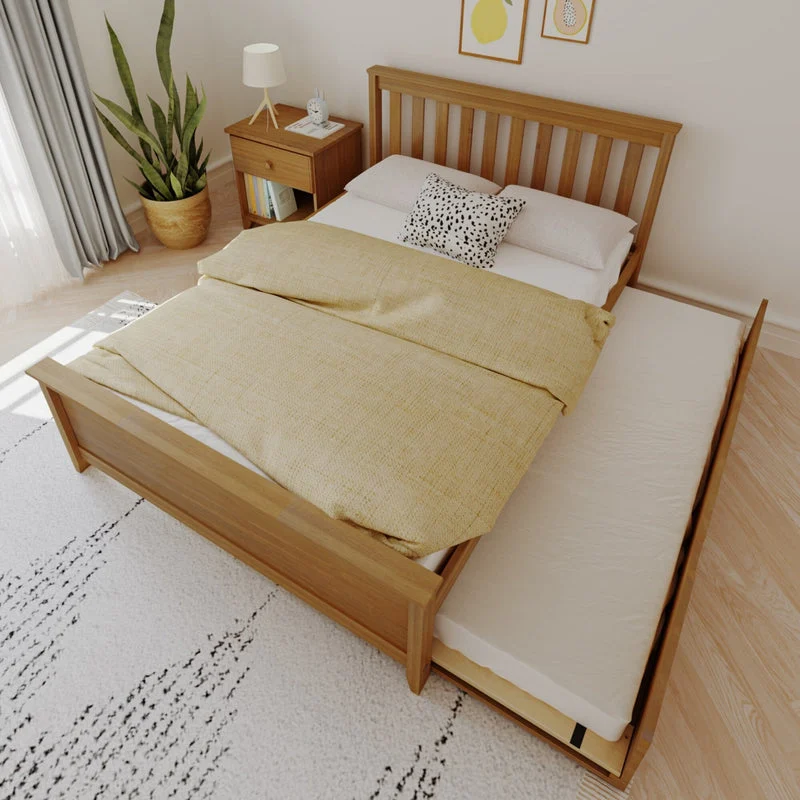 Max and Lily Full Platform Bed With Trundle in Pecan - overhead view of the made bed in a bedroom with the trundle mattress pulled out