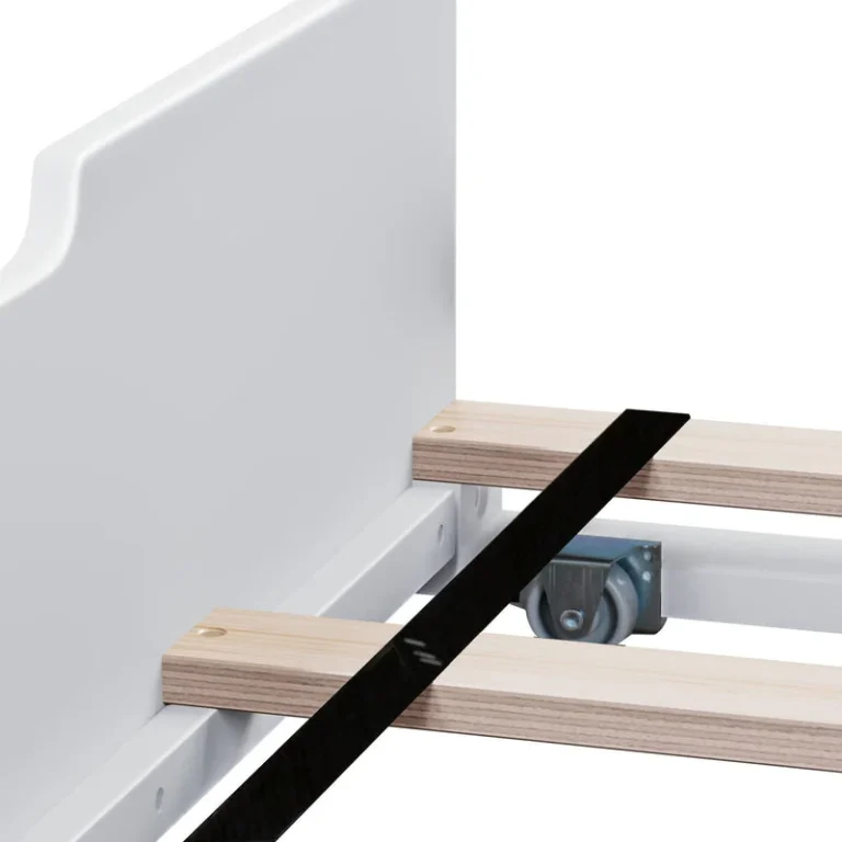 Max And Lily Full Platform Bed With Trundle White Trundle Caster Detail Max and Lily Full Platform Bed With Trundle in White - closeup of the trundle drawer's caster wheel, wooden slats and support bar