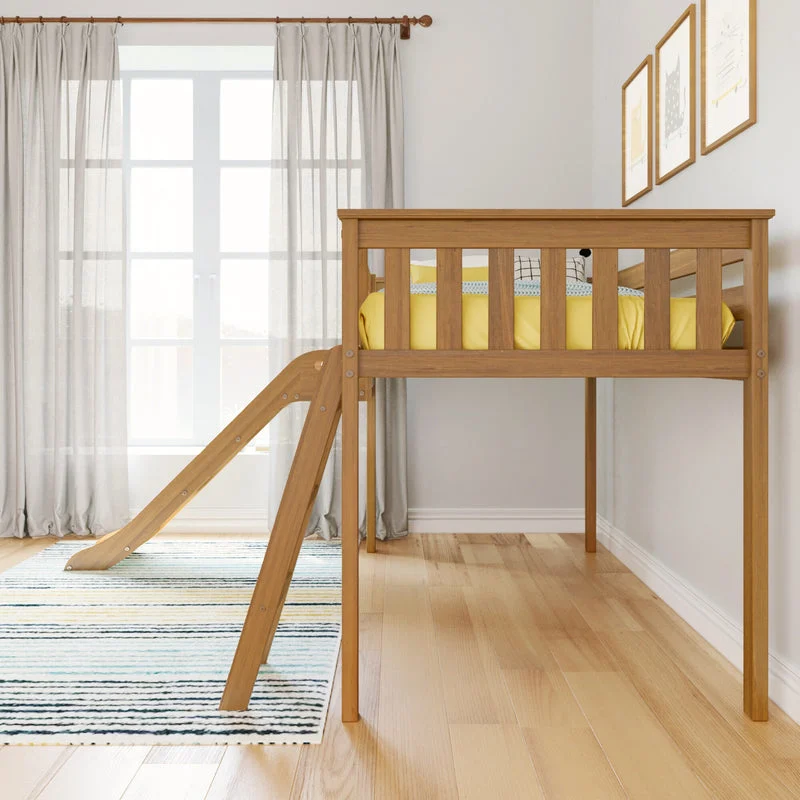 Max And Lily Low Loft Bed With Ez Slide Pecan Side View Max and Lily Low Loft Bed With EZ Slide in Pecan - side view in a bedroom showing the slide descending to the floor and the slatted guardrails.