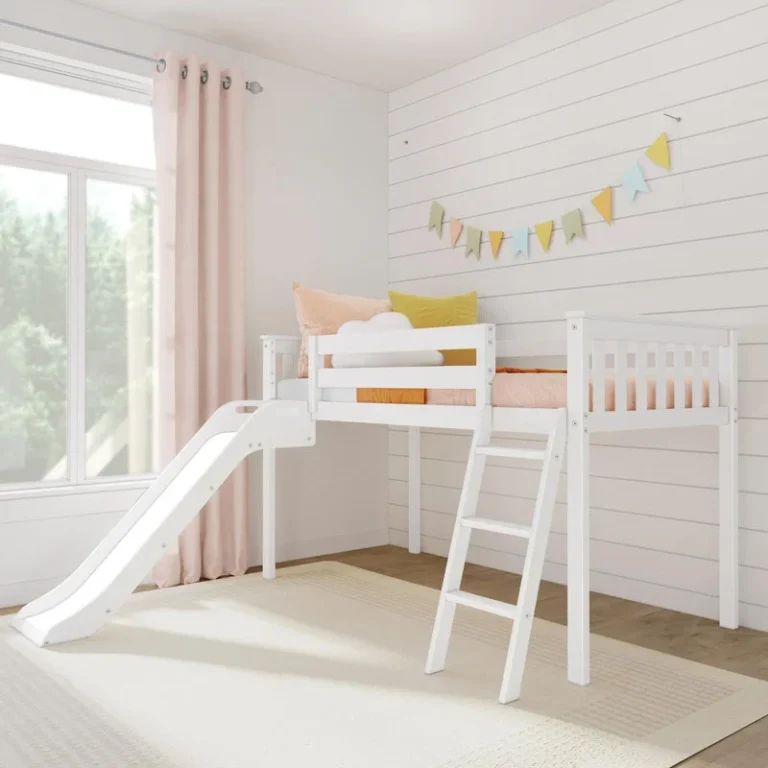 Max And Lily Low Loft Bed With Ez Slide White Angle View 1 Max and Lily Low Loft Bed With EZ Slide in White - angle view in a styled kids' bedroom with attached slide and ladder