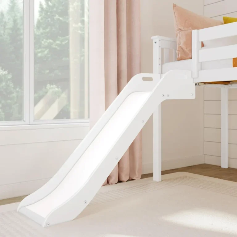Max And Lily Low Loft Bed With Ez Slide White Slide Detail Max and Lily Low Loft Bed With EZ Slide in White - close-up of the white attached slide beside a window