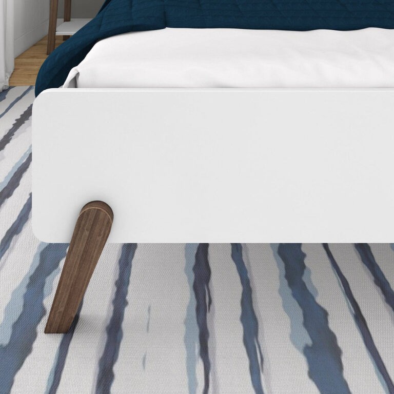 Max and Lily Mid-Century Modern Queen Size Bed in White/Walnut - close-up of the footboard and angled walnut wood leg