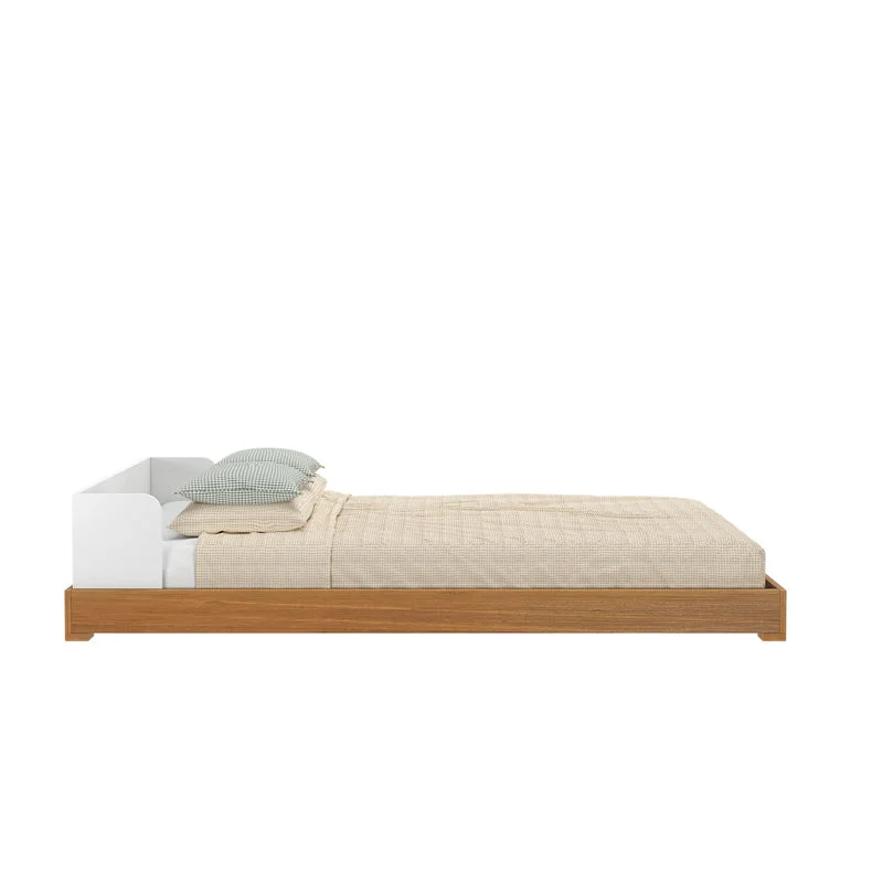 Max and Lily Mid-Century Modern Twin Floor Bed in White/Pecan - side profile showing the low-to-the-floor platform height with mattress and pillows in place