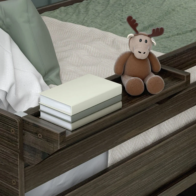 Max and Lily Modern Farmhouse Bedside Tray in Barnwood Brown - close-up of the tray attached to a bed rail holding stacked books and a plush moose toy