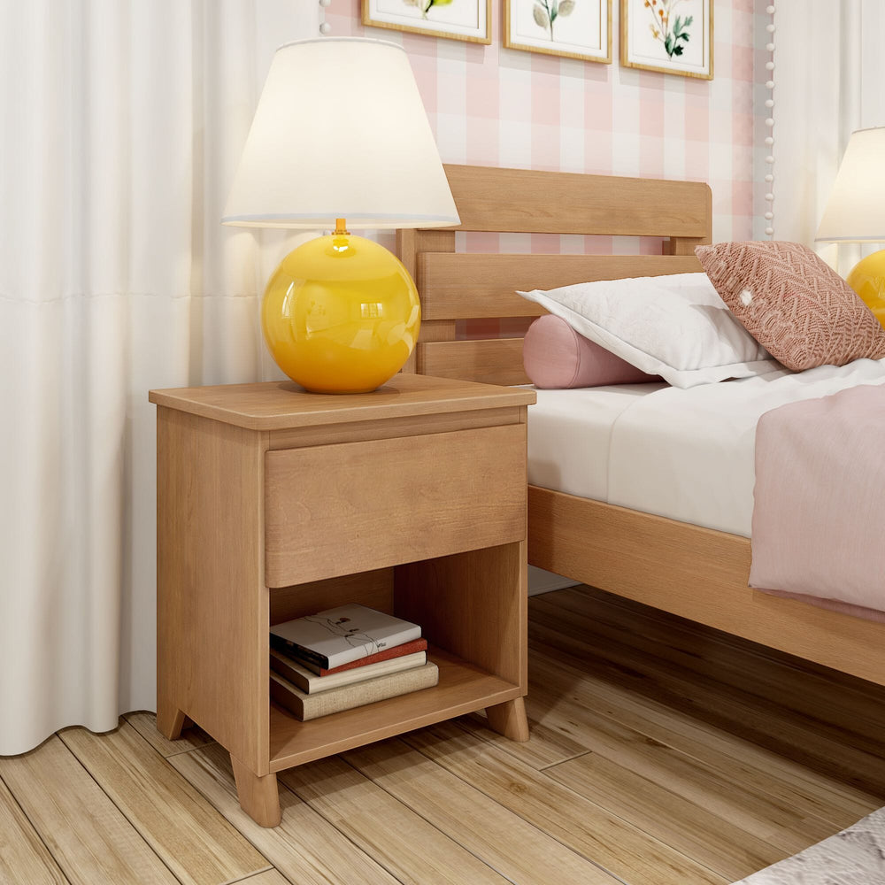 Max And Lily Modern Farmhouse Night Stand Pecan Room Scene 1 Max and Lily Modern Farmhouse Night Stand in Pecan - styled beside a bed with a lamp on top and books stored on the open lower shelf.