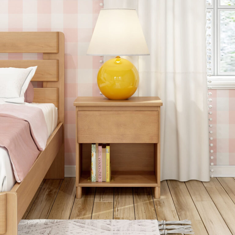 Max And Lily Modern Farmhouse Night Stand Pecan Room Scene 2 Max and Lily Modern Farmhouse Night Stand in Pecan - shown in a bedroom with a lamp on top and books on the open lower shelf.