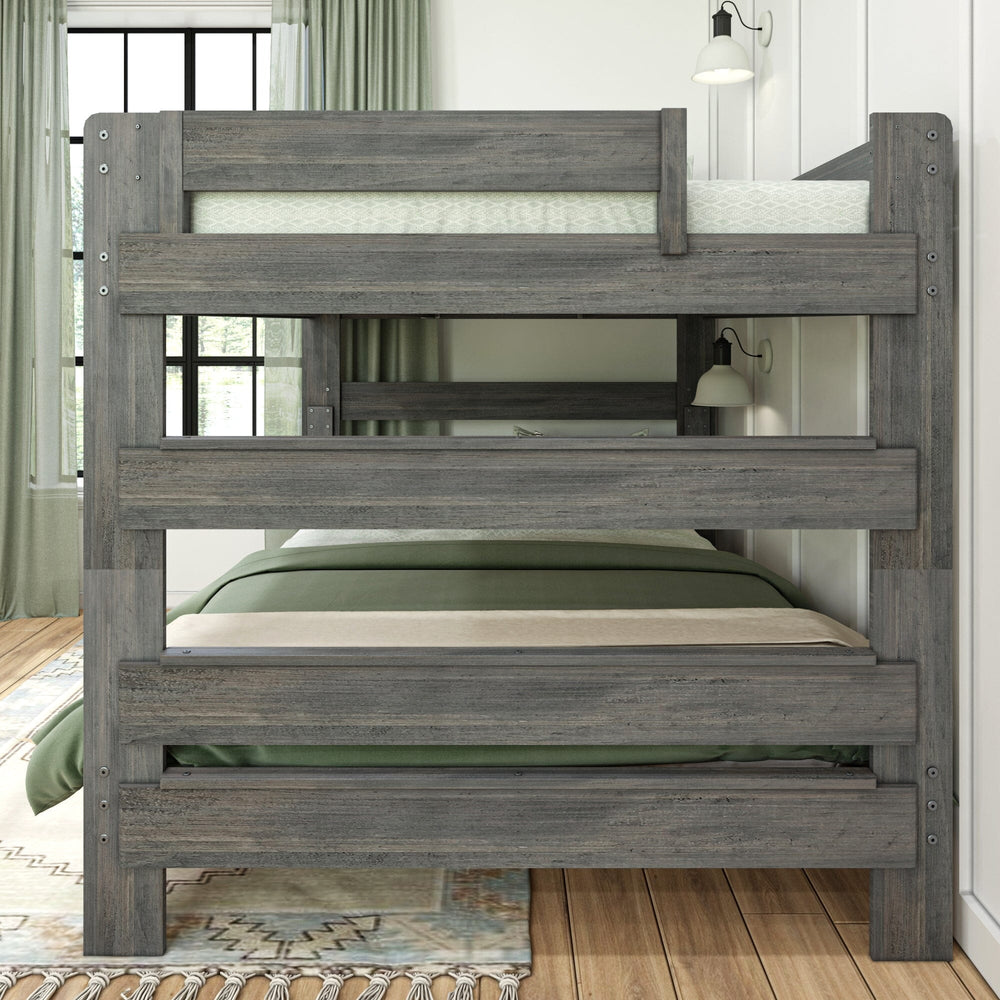 Max and Lily Modern Farmhouse Queen Over Queen Bunk Bed in Driftwood - front view in a styled bedroom with green bedding and a wall sconce