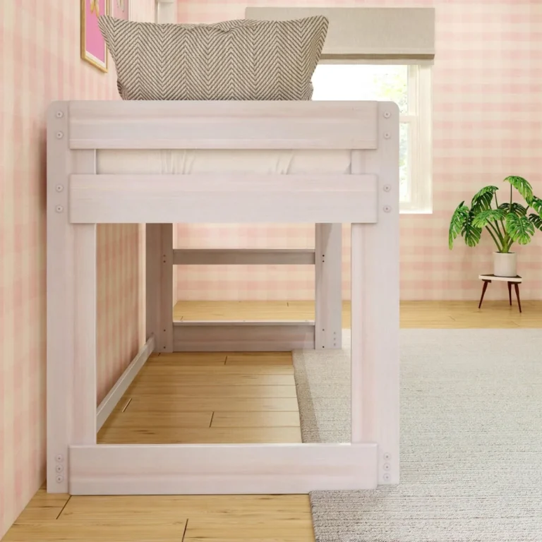 Max And Lily Modern Farmhouse Twin Low Loft Bed White Wash End View Max and Lily Modern Farmhouse Twin Low Loft Bed in White Wash - end view in a pink bedroom with a throw pillow on top and open space underneath.