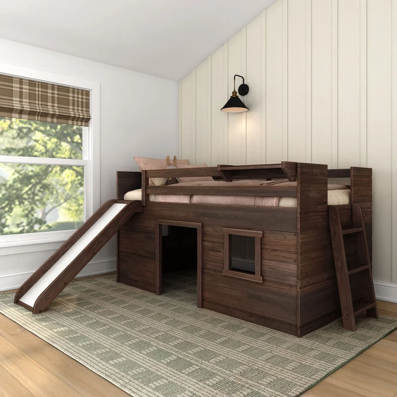 Max and Lily Modern Farmhouse Twin Low Loft Bed with Slide in Barnwood Brown - styled in a bedroom with the white slide, playhouse below with a window cutout, and ladder beside a plaid-curtained window.