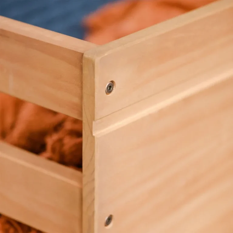 Max And Lily Modern Farmhouse Twin Low Loft Bed With Slide Pecan Finish Closeup Max and Lily Modern Farmhouse Twin Low Loft Bed with Slide in Pecan - close-up of the guardrail corner joint and solid wood grain finish