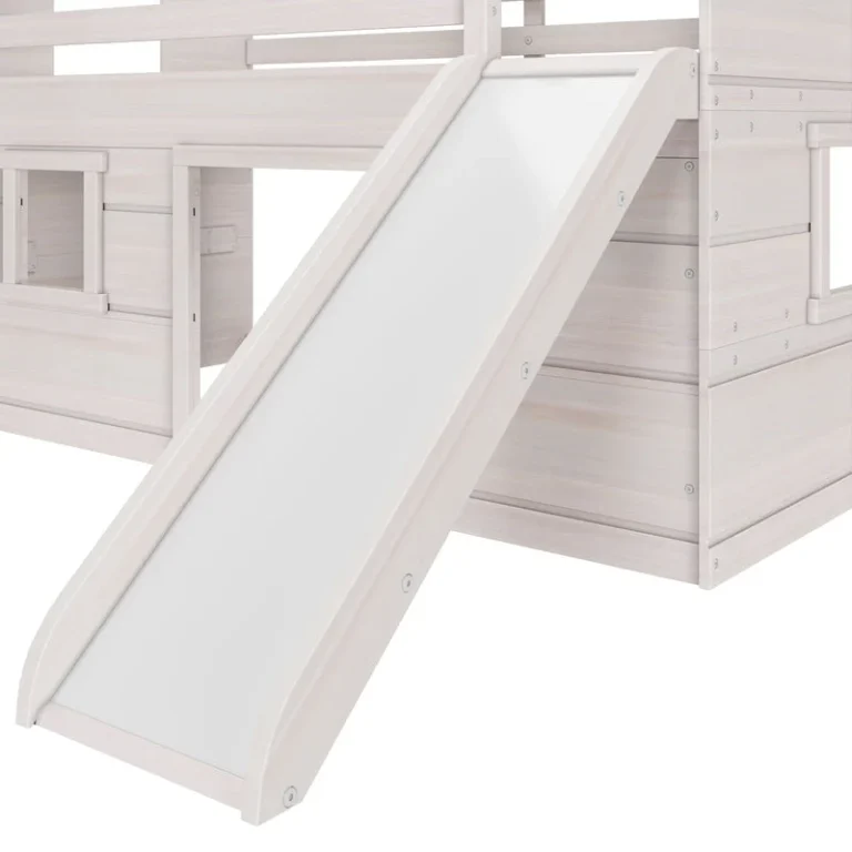 Max And Lily Modern Farmhouse Twin Low Loft Bed With Slide White Slide Detail 5 Max and Lily Modern Farmhouse Twin Low Loft Bed in White - close-up of the attached slide and the playhouse window cutouts on the bed frame.