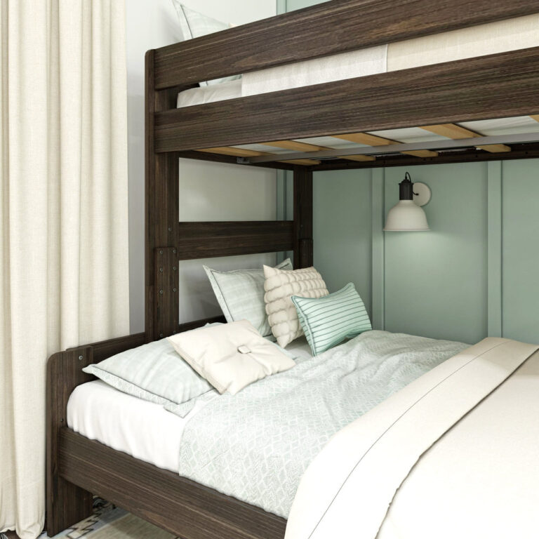 Max and Lily Modern Farmhouse Twin Over Full Bunk Bed in Barnwood Brown - close-up of the lower full bed with decorative pillows and the wood slat support beneath the upper bunk.