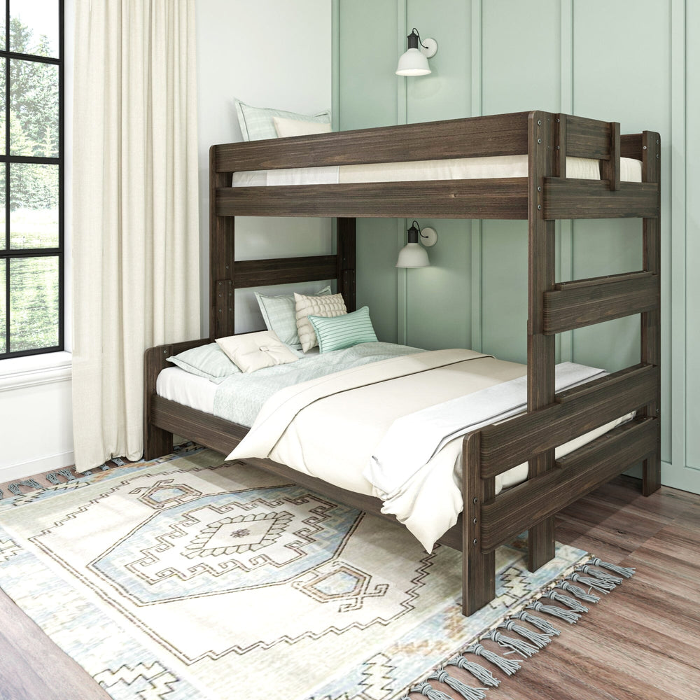 Max and Lily Modern Farmhouse Twin Over Full Bunk Bed in Barnwood Brown - angled room view with both bunks styled with bedding against a green panelled wall with wall sconces.