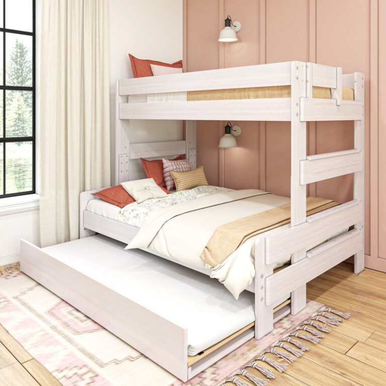 Max and Lily Modern Farmhouse Twin Over Full Bunk Bed With Trundle in White Wash - styled kids bedroom showing the twin over full bunk with the trundle pulled out and safety guardrails.