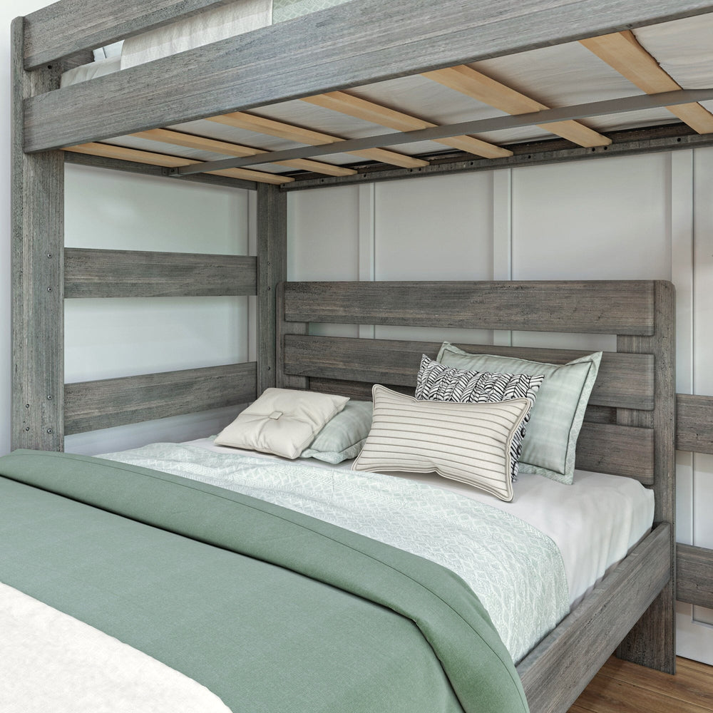 Max and Lily Modern Farmhouse Twin Over Full L-Shaped Bunk Bed in Driftwood - close-up of the lower full bed headboard and the slatted underside of the upper twin bunk.