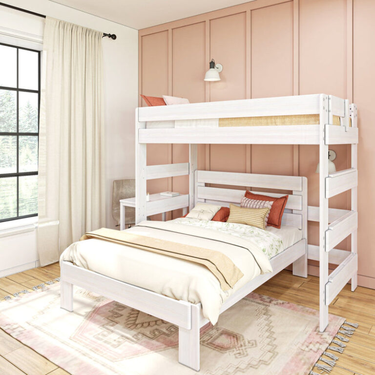 Max and Lily Modern Farmhouse Twin Over Full L-Shaped Bunk Bed With Desk in White Wash - styled in a pink bedroom with the full-size lower bed, twin upper bunk, side study desk, ladder, curtains, and area rug.