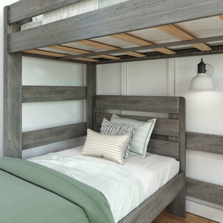 Max and Lily Modern Farmhouse Twin Over Twin L-Shaped Bunk Bed in Driftwood - close-up of the lower bed headboard and the wooden slat supports beneath the upper bunk with decorative pillows