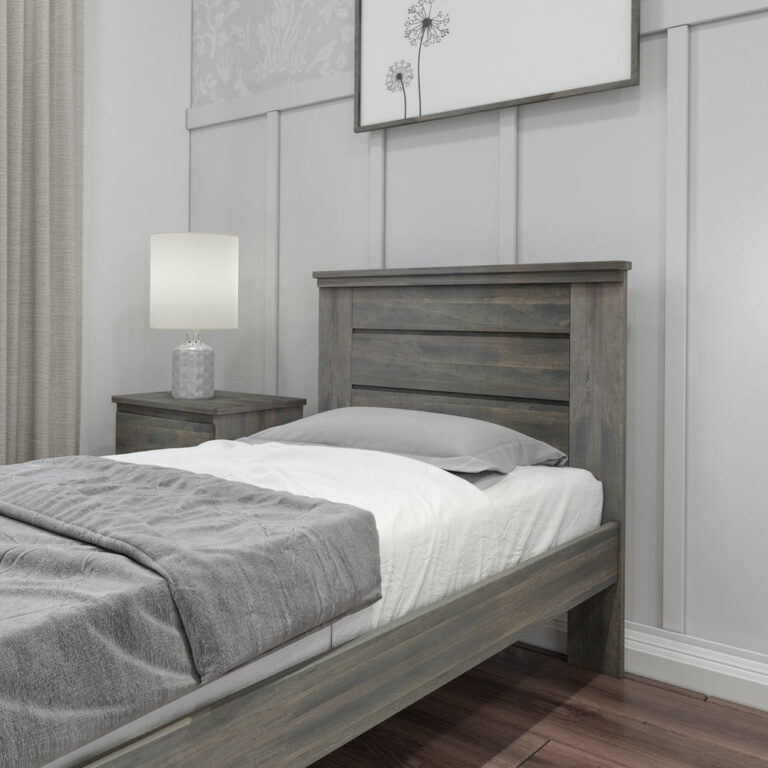 Max And Lily Modern Farmhouse Twin Panel Bed Driftwood Headboard Detail Max and Lily Modern Farmhouse Twin Panel Bed in Driftwood - close-up of the plank-style panel headboard beside a nightstand and lamp