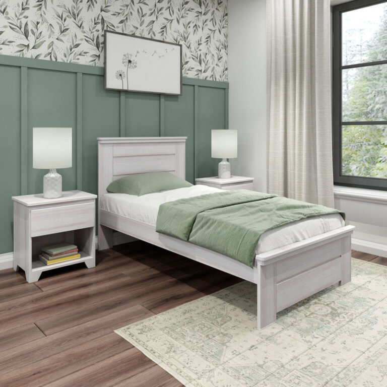Max And Lily Modern Farmhouse Twin Panel Bed White Wash Room Scene 1 Max and Lily Modern Farmhouse Twin Panel Bed in White Wash - angled view in a styled bedroom with two nightstands, table lamps, and green bedding.