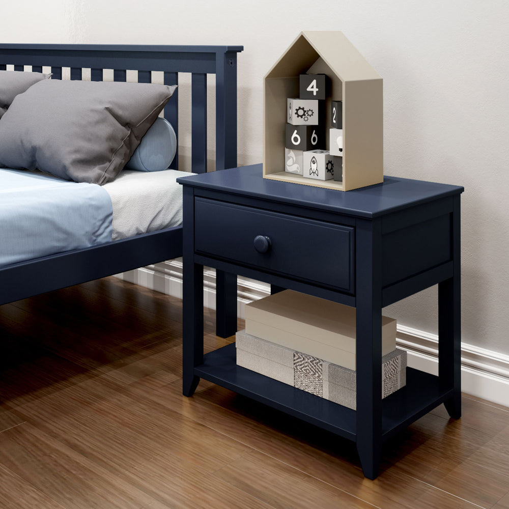Max and Lily Night Stand With Drawer and Shelf in Blue - styled beside a bed with decor on the top and lower shelf