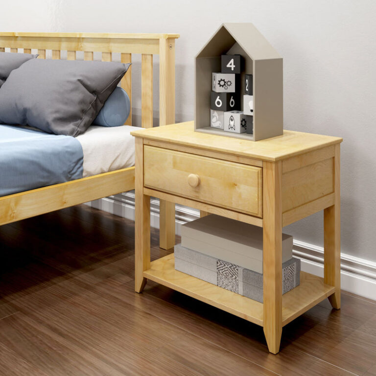 Max And Lily Night Stand With Drawer And Shelf Natural Room Scene 1 Max and Lily Night Stand With Drawer and Shelf in Natural - styled in a bedroom beside a natural wood bed, showing the single drawer and open lower shelf with decorative boxes.