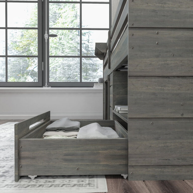 Max and Lily Solid Wood Play and Store Low Loft in Driftwood - close-up of the roll-out under-bed storage drawer filled with folded blankets beside a sunny window.