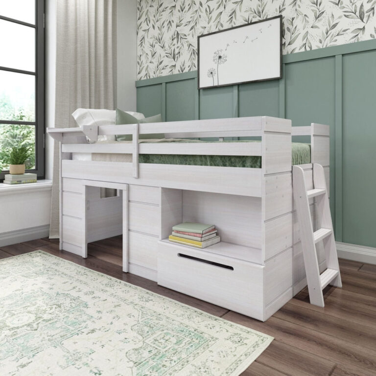 Max and Lily Solid Wood Play and Store Low Loft in White - angled view of the low loft bed styled in a green and white bedroom with attached desk, storage drawers, ladder, and safety guardrails